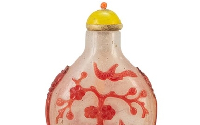 CHINESE OVERLAY GLASS SNUFF BOTTLE In pear shape, with red bird and flowering tree design on an opalescent ground. Height 2.3". Glas...