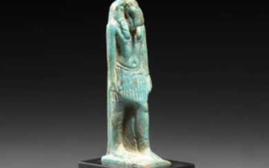 AN EGYPTIAN FAIENCE AMULET OF THOTH Late Period,...