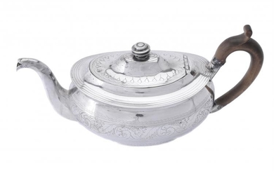 A George III Irish silver oval tea pot by Robert Breading