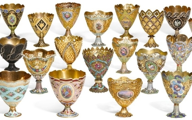 AN IMPORTANT COLLECTION OF TWENTY ENAMELLED GOLD AND GILT ZARFS, MADE FOR THE OTTOMAN MARKET, SWITZERLAND, 19TH CENTURY