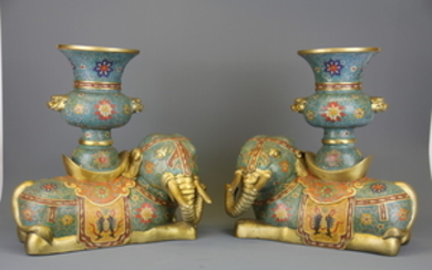 An impressive pair of Chinese cloisonn� on gilt bronze elephant vases, H. 34cm.