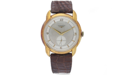 Longines. An Oversized Yellow Gold Wristwatch with Two-Tone Dial