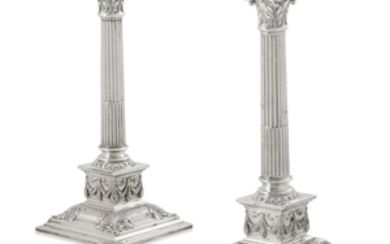 A pair of Neoclassical style sterling silver weighted candlesticks