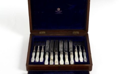 Twelve pairs of silver dessert knives and forks