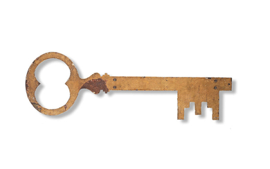 A wrought iron trade sign, in the form of a key