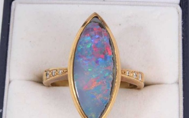 18ct gold opal doublet cocktail ring with diamond set shoulders
