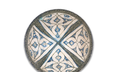 A Kashan underglaze-painted pottery bowl, Persia, 12th/ 13th Century