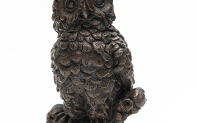 A SMALL BRONZE OWL ON BASE