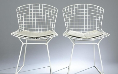 5 Bertoia wire side chairs.