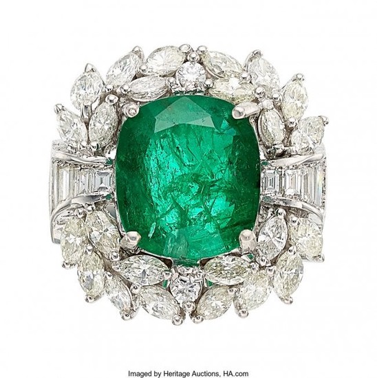 55318: Emerald, Diamond, White Gold Ring The ring cent