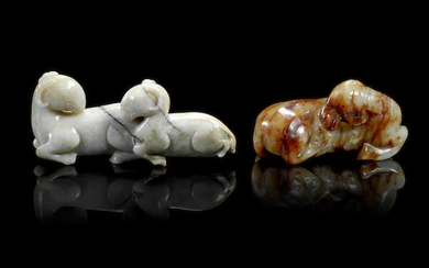A 'chicken bone' jade carving of two rams and a russet jade carving of a horse