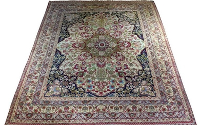 A Persian Lavar Kerman carpet