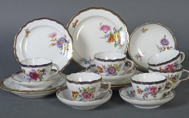 6 coffee/cake sets Meissen, mostly after 1934 (three pieces 1860-1924), porcelain, white glazed resp. the rims cobalt blue glazed, with diagonal summer flowers bouquet in on-glaze painting and gold A-edge and gold rim, 18 pcs. dam. consisting of 6...