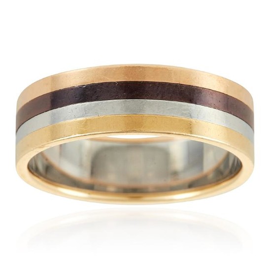 A QUATRE BAND RING, BOUCHERON in 18ct gold and steel