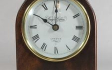 A modern inlaid mahogany mantle clock by Knight & Gibbins, London.