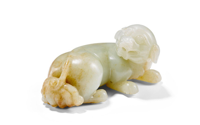 A CELADON JADE CARVING OF A MYTHICAL BEAST