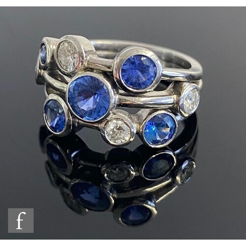 A 18ct hallmarked white gold Boodles style tanzanite and dia...