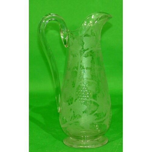 A 19th Century Glass Round Bulbous Water Jug having all over...