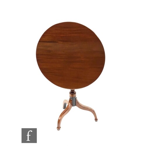 A 19th Century inlaid mahogany circular occasional table, tu...