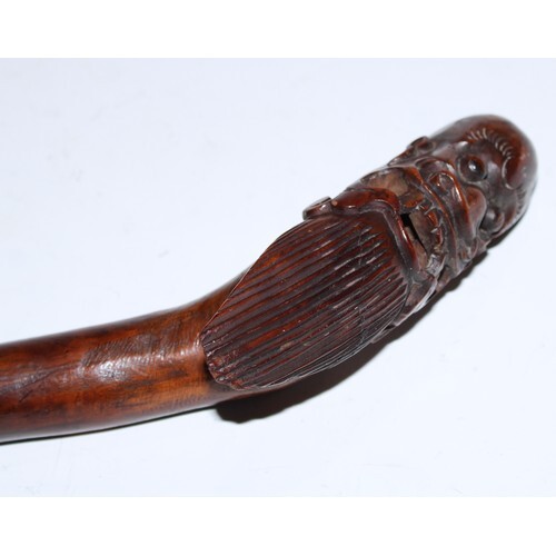 A 19th century Chinese rootwood walking stick, the pommel ca...