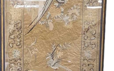 A 19th century Chinese silk embroidery of birds amongst foliage,...