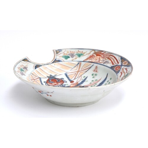 A 19th century Japanese Imari shaving bowl, with central flo...