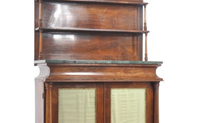 A 19th century Victorian rosewood chiffonier - sideboard. The chiffonier having a two tier gallery back with scrolled carved pediment top with turned spindle supports over a green marble top. Below two silk panelled doors with ornate brass mounts...