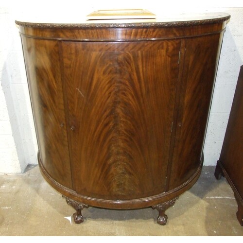 A 20th century mahogany bow-fronted sideboard fitted with th...