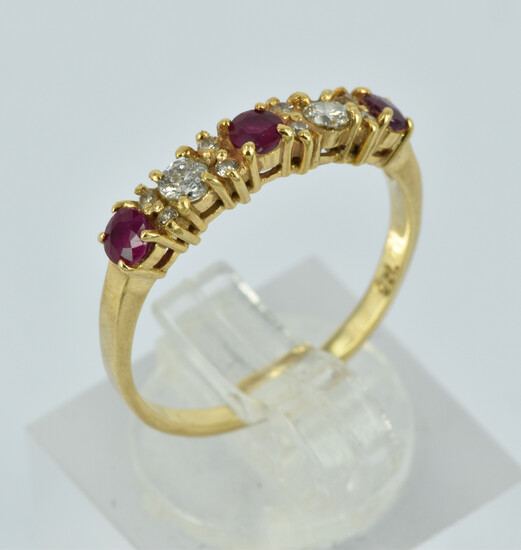 A 9CT GOLD, DIAMOND AND RUBY RING