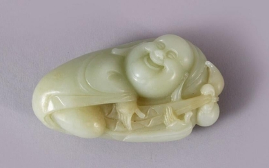 A CHINESE CARVED JADE FIGURE / PENDANT OF BUDDHA, in a