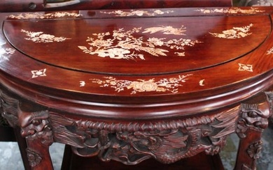 A CHINESE CARVED ROSEWOOD DEMILUNE STAND WITH INLAY