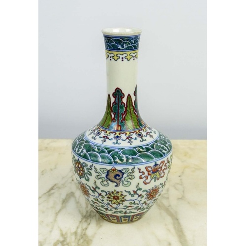 A CHINESE FAMILLE VERTE BOTTLE VASE, Qianlong style, with fo...