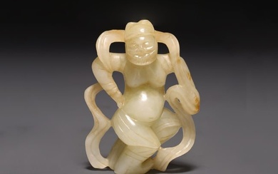 A CHINESE WHITE JADE 'DANCING FOREIGNER'