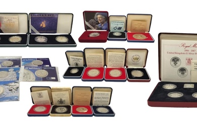 A COLLECTION OF NINETEEN ROYAL MINT SILVER PROOF COINS,...