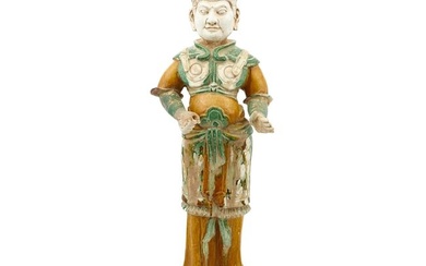A Chinese Sancai Glazed Pottery Figure of a Guardian Tang Dynasty