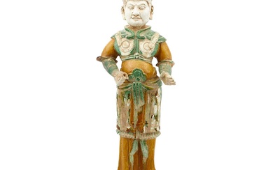 A Chinese Sancai Glazed Pottery Figure of a Guardian Tang Dynasty