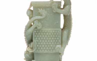 A Chinese White Jade Vase with Dragon Figure
