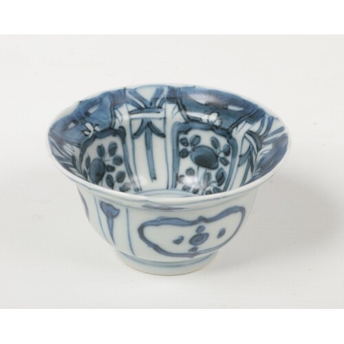 A Chinese blue and white kraak porcelain teabowl with everte...