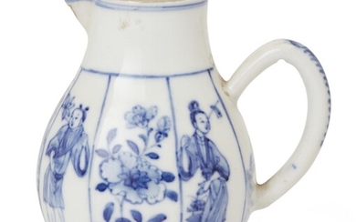 A Chinese blue and white milk jug, Yongzheng period, the pear shape body of slightly octagonal form, decorated to the body with alternating panels of boys, ladies flower branches and landscapes, a c shape handle attached to the body with a small...