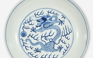 A Chinese blue and white porcelain "Dragon" dish