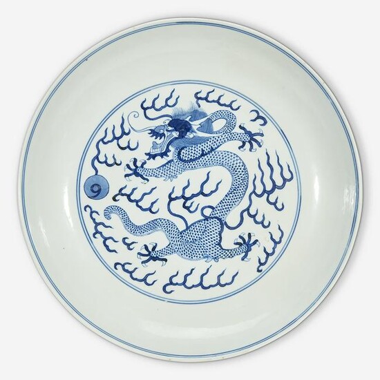 A Chinese blue and white porcelain "Dragon" dish