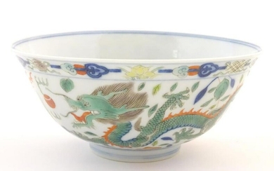 A Chinese bowl with dragon and flaming pearl detail