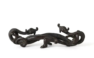 A Chinese bronze 'double-chilong' brush rest Yuan dynasty Cast as a pair...