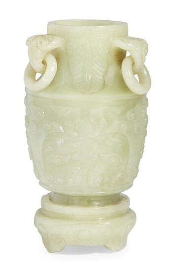 A Chinese green carved hardstone archaistic vase...