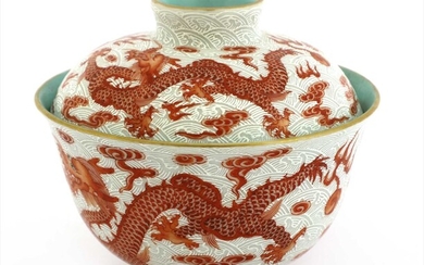 A Chinese iron-red tea bowl and cover