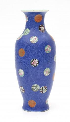 A Chinese porcelain famille rose vase, decorated with medallions on a incised blue ground. With a Shuanzu seal mark, Ju Reng Tang Zhi. Republic period.