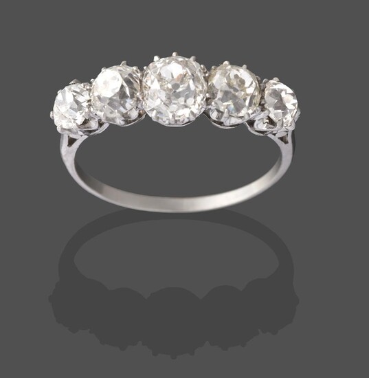 A Diamond Five Stone Ring, the graduated old cut diamonds in white claw settings, to a tapered...