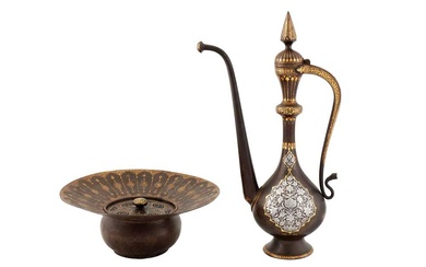 A FINE QAJAR SILVER-OVERLAID GOLD-DAMASCENED STEEL EWER AND A STEEL BASIN WITH OPENWORK COVER Qajar Iran, mid to late 19th century