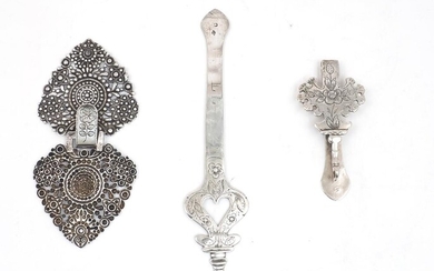A French chatelaine clip and attachment, 800 standard, with floral decoration, 19.7cm wide and 10cm wide, together with a French belt buckle, 800 standard, in the form of leaves with pierced repousse foliate design, indistinct hallmark and maker's...