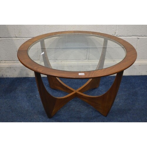 A G PLAN ASTRO CIRCULAR TEAK COFFEE TABLE, with a glass inse...